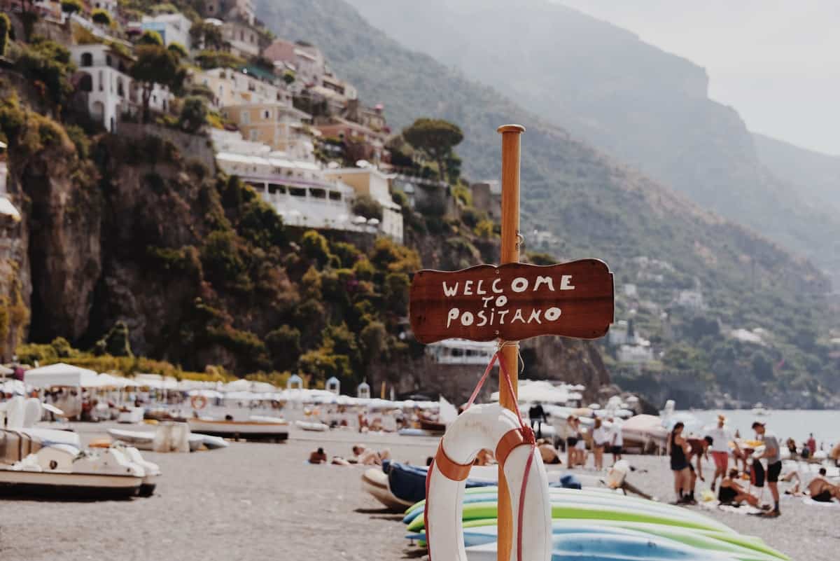 brown Welcome to Positano sign